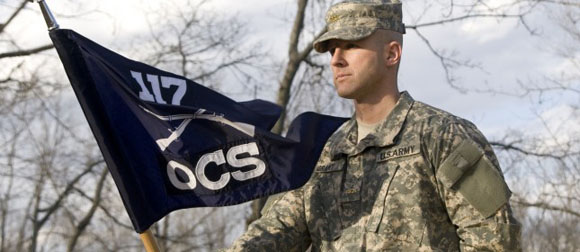 Image soldier carrying OCS flag 